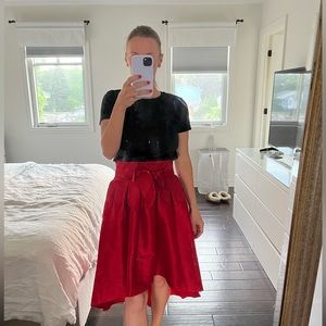 Red high low skirt
